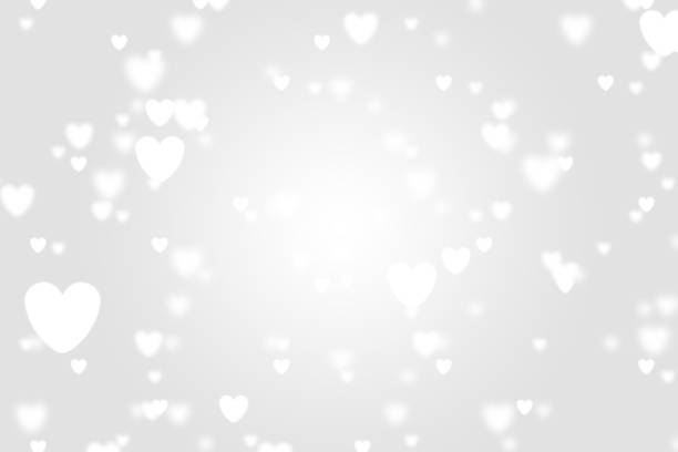 istock Heart icon bokeh on grey color background. 1147816843