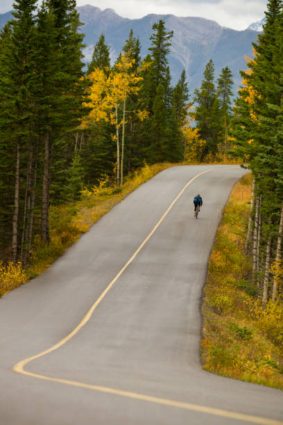 istock Banff Road Bicycle Rider 1147816860
