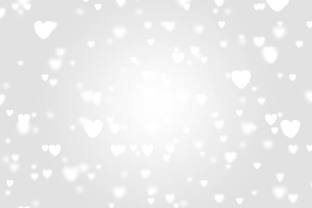istock Heart icon bokeh on grey color background. 1147817412