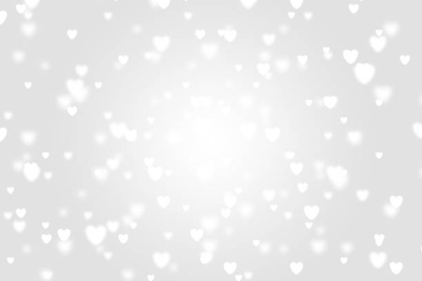 istock Heart icon bokeh on grey color background. 1147817441