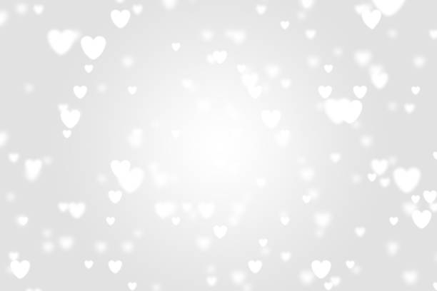 istock Heart icon bokeh on grey color background. 1147817495