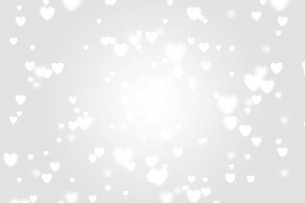 istock Heart icon bokeh on grey color background. 1147817500
