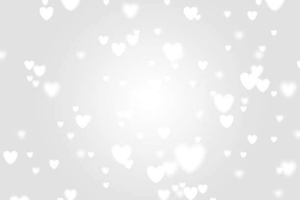 istock Heart icon bokeh on grey color background. 1147817501