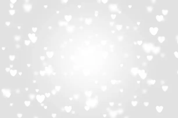Heart icon bokeh on grey color background for Christmas festival or winter season contents or for wallpaper or paper for contents about winter for love content or valentine day or for wallpaper.