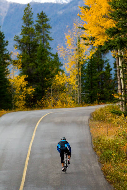 istock Banff Road Bicycle Rider 1147817571