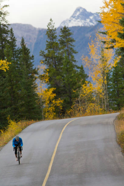 istock Banff Road Bicycle Rider 1147817573
