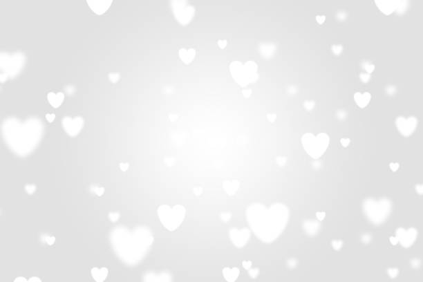 istock Heart icon bokeh on grey color background. 1147817582
