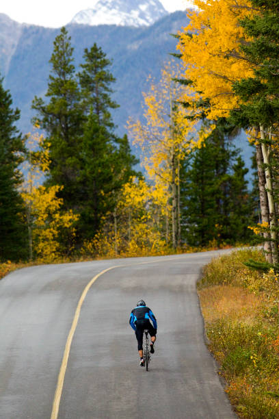 istock Banff Road Bicycle Rider 1147817680