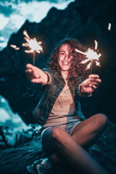 istock Cute Female Celebrating Life During Mountain Sunset 1147820423