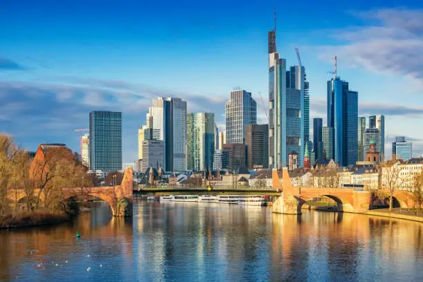 Stock photograph of the skyline of Frankfurt am Main and River Main in Germany on a sunny day.