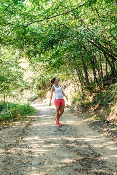 istock Girl in the forest 1147822590