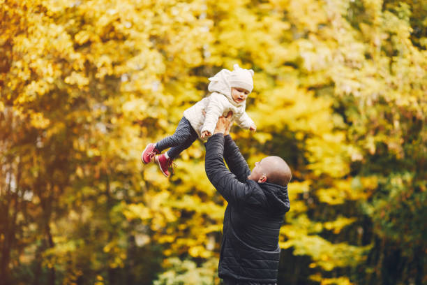 istock Family in a autumn park 1147822731