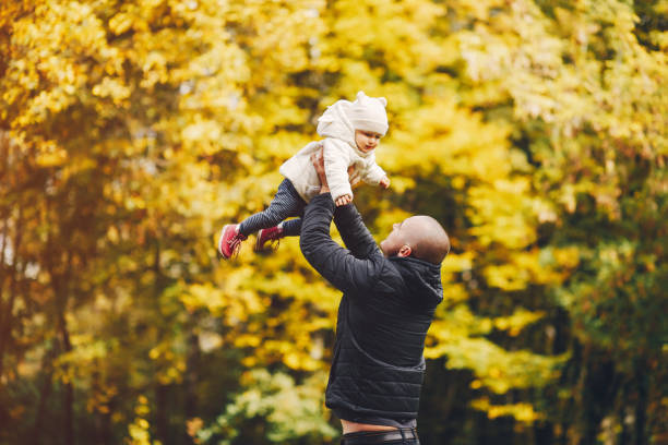 istock Family in a autumn park 1147822888