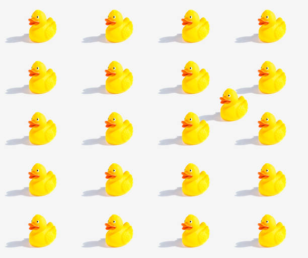 istock Pattern of a yellow rubber duck for the bathroom on a white background 1147824522