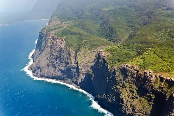 An aerial view of the rugged cliff of Kalaupapa on the island of Molokai in Hawaii. Kalaupapa was at one time a colony of leprosy in the United States. It is now a national Historical Park in Hawaii.
