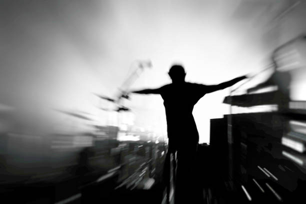 silhouette of a man on the stage