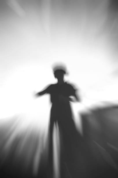 Blurred silhouette of a girl Blurred silhouette of a girl religion sunbeam one person children only stock pictures, royalty-free photos & images