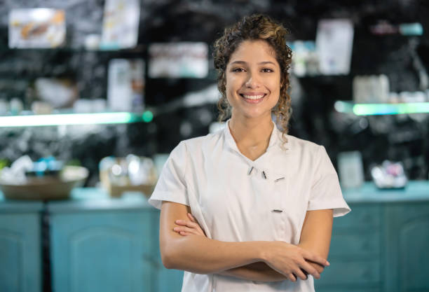 istock Beautiful masseuse working at a spa 1147827223