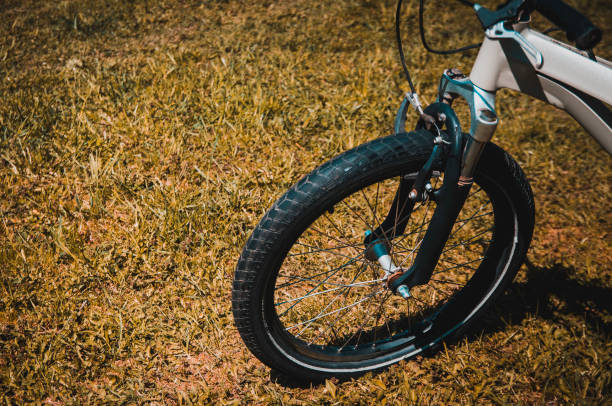 istock Bike on grass, view from the front wheel 1147829277