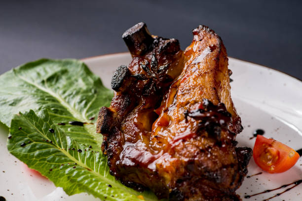 istock fried and baked meat ribs with sauce and spices 1147829377