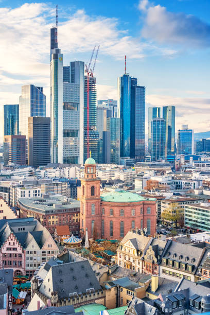 Stock photograph of the skyline of downtown Frankfurt am Main Germany with the old town in the foreground on a sunny day.