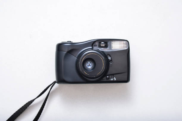 istock Vintage film camera close-up, white background 1147830577
