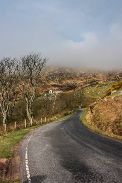 istock Coastal Road in Barra, Scotland 1147832123