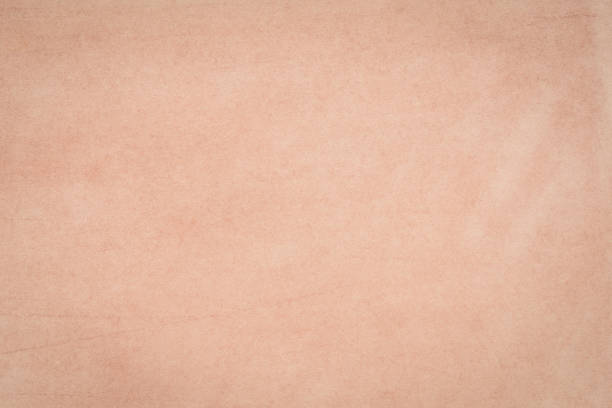 istock orange pastel on  paper background texture 1147835845