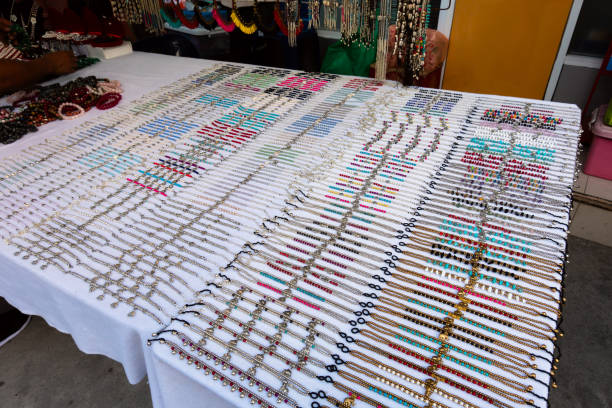 Lots of necklaces or wristbands showcased in a tourist shop in Thailand