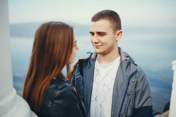 istock Couple in autumn park 1147841410