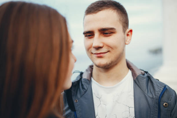 istock Couple in autumn park 1147841478