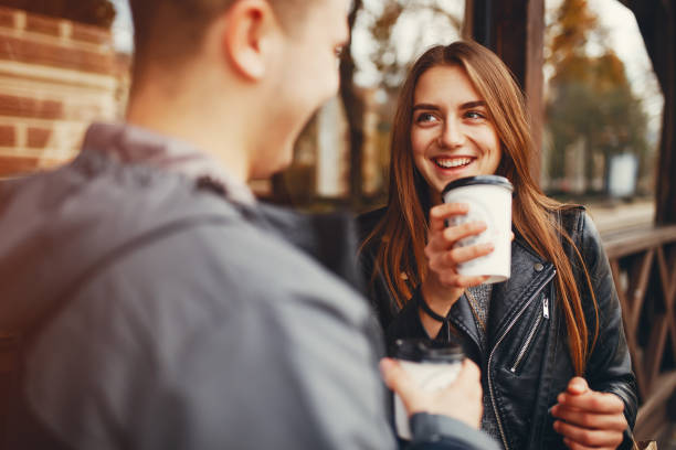 istock Couple in autumn park 1147842683