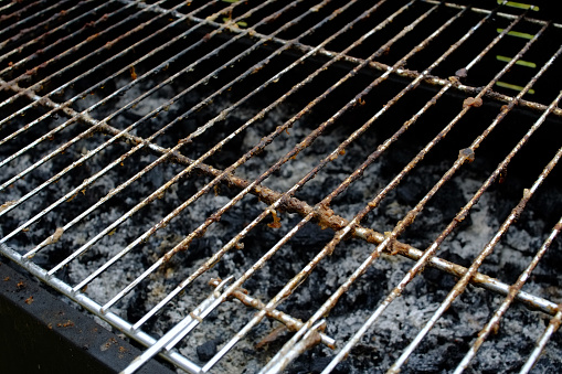 Dirty greasy barbecue grill.