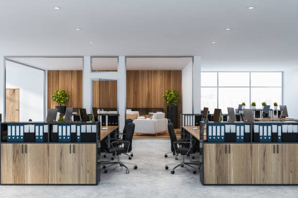 istock Side view of white and wooden open space office 1147846489