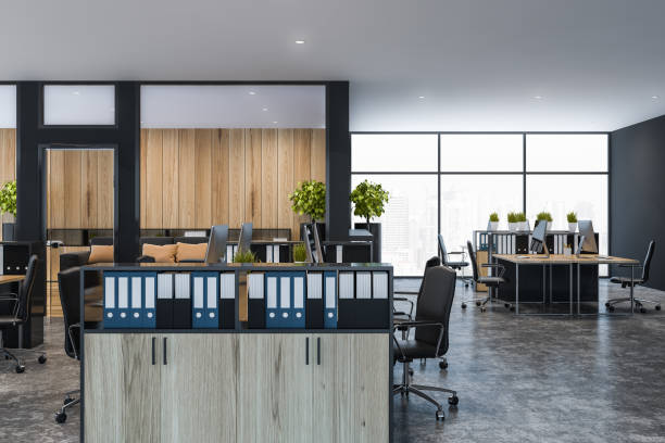 istock Gray and wooden open space office interior 1147846509