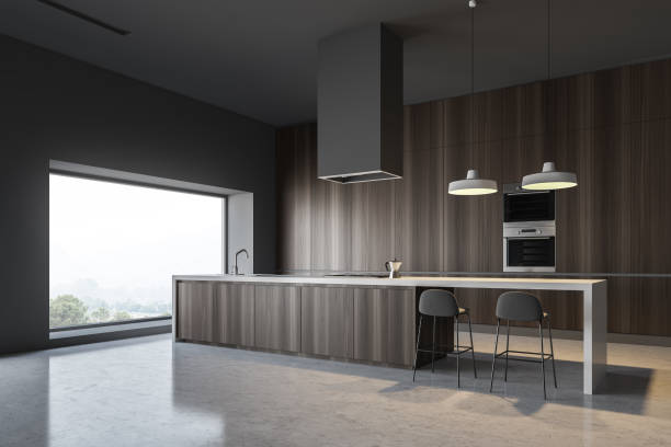istock Dark wooden kitchen corner with bar and ovens 1147846528