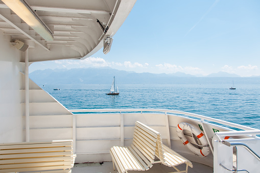 Open deck of modern passenger boat on Lake Leman (Geneva Lake) on beautiful sunny summer day