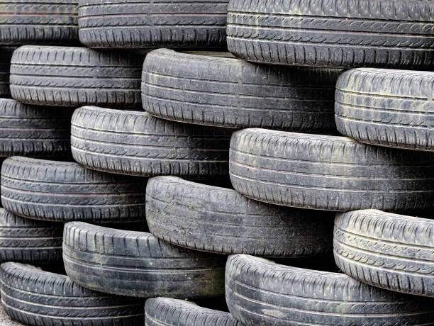 istock Heap of used car tyres background 1147849552