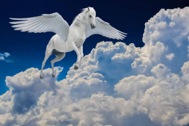 istock Pegasus winged legendary white horse flying with spread wings in cloudy sky 1147851319