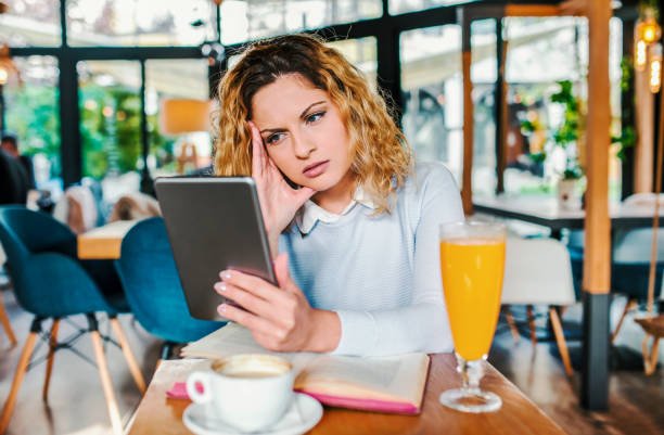 istock Young student learning in the cafe. Education, lifestyle concept 1147852161
