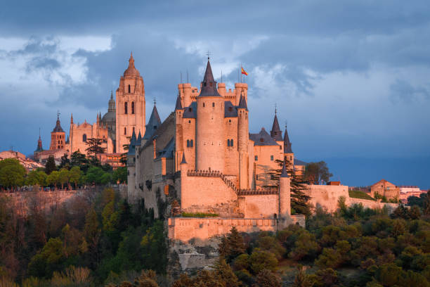 famous royal castle of alcazar at Segovia Segovia, Spain. 25th April, 2019: beautiful alcazar castle of Segovia, Spain el alcazar palace seville stock pictures, royalty-free photos & images