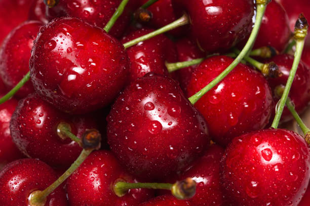 istock Fresh raw ripe cherries with water drops 1147852376