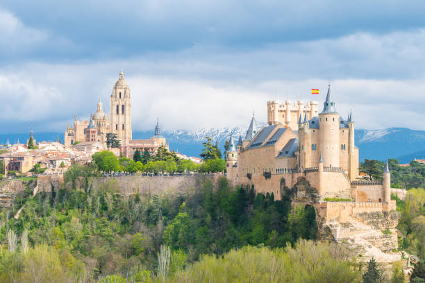 famous royal castle of alcazar at Segovia Segovia, Spain. 25th April, 2019: beautiful alcazar castle of Segovia, Spain el alcazar palace seville stock pictures, royalty-free photos & images