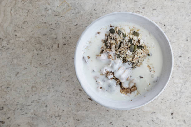 istock Top view of muesli bowl with yogurt 1147854052