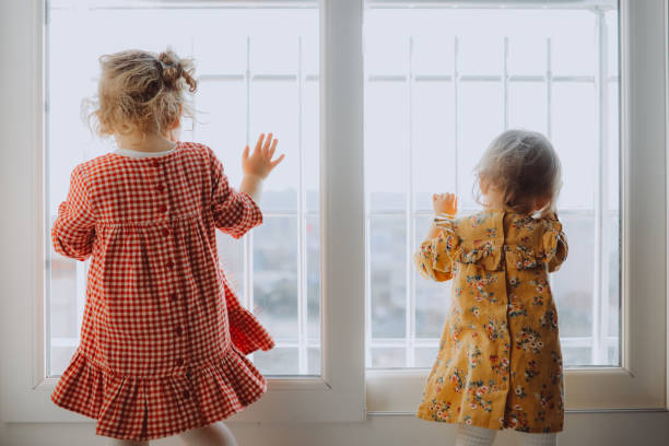 istock Kids dancing at home 1147860566