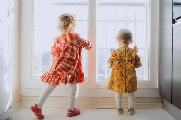 istock Kids dancing at home 1147861254