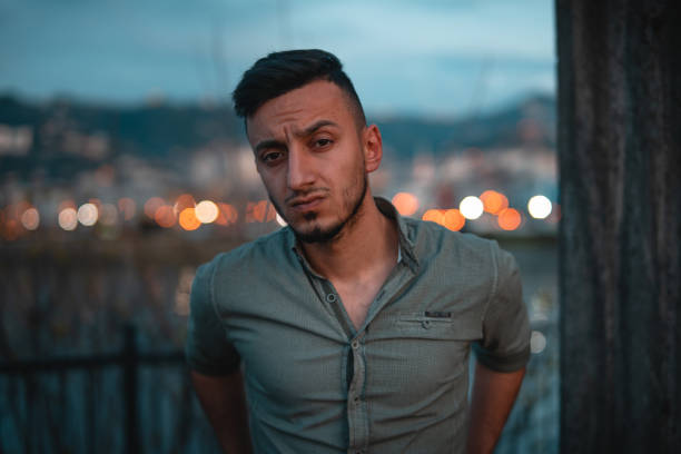 istock Portrait of a young handsome man looking at the camera 1147862012