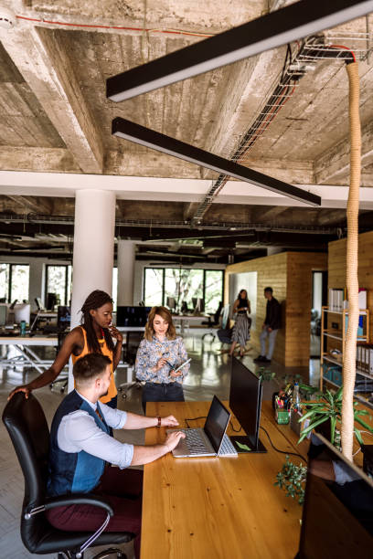 istock Friendly Business Team At Office 1147864575