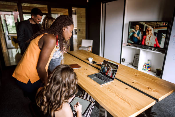 istock Having VoIP With Their Colleagues Abroad 1147864582