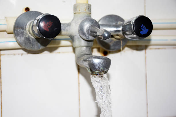 istock Bathroom faucet and water drops 1147868848